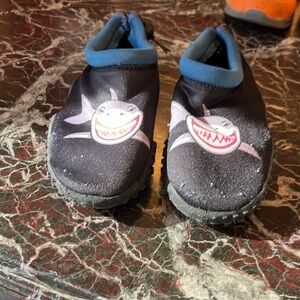 Zogg’s water shoes, a little worn but still good for the beach